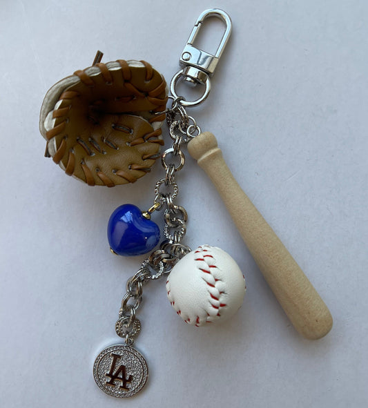 Baseball-themed keychain with a bat, ball, and LA Dodgers emblem on a white background